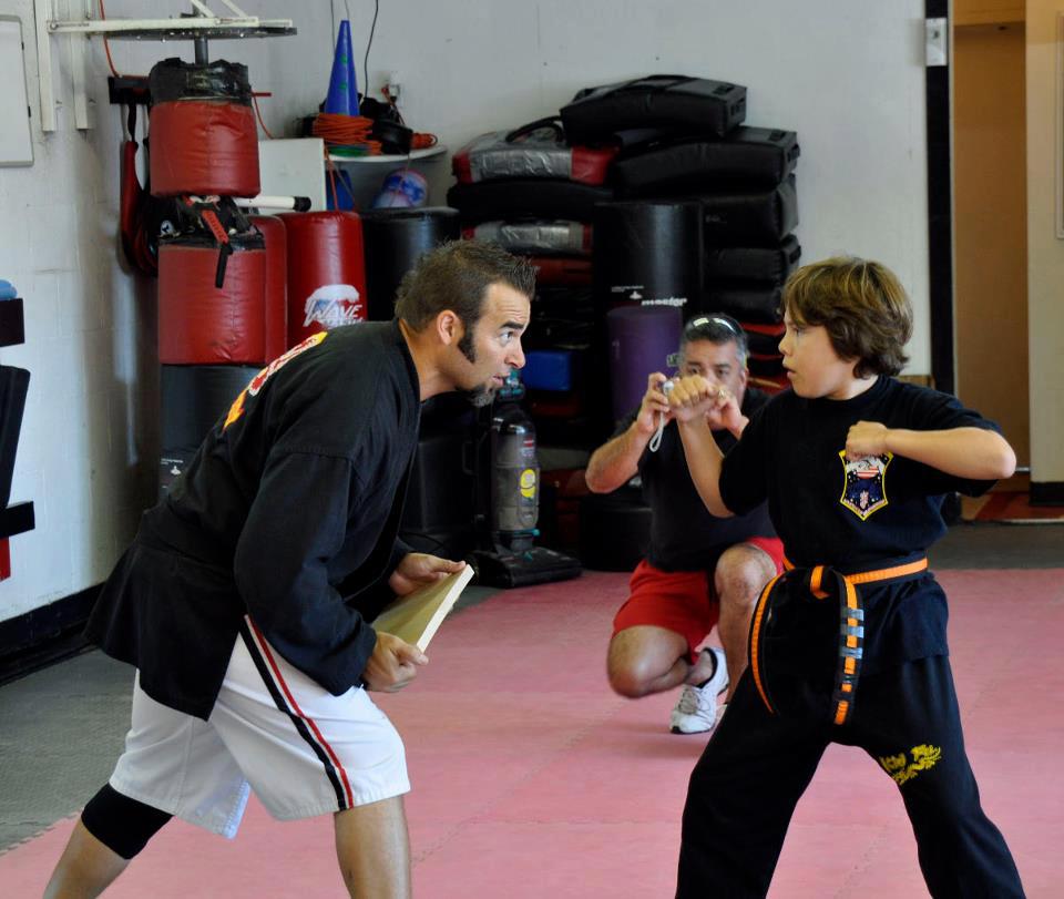instructor and child mid-lesson